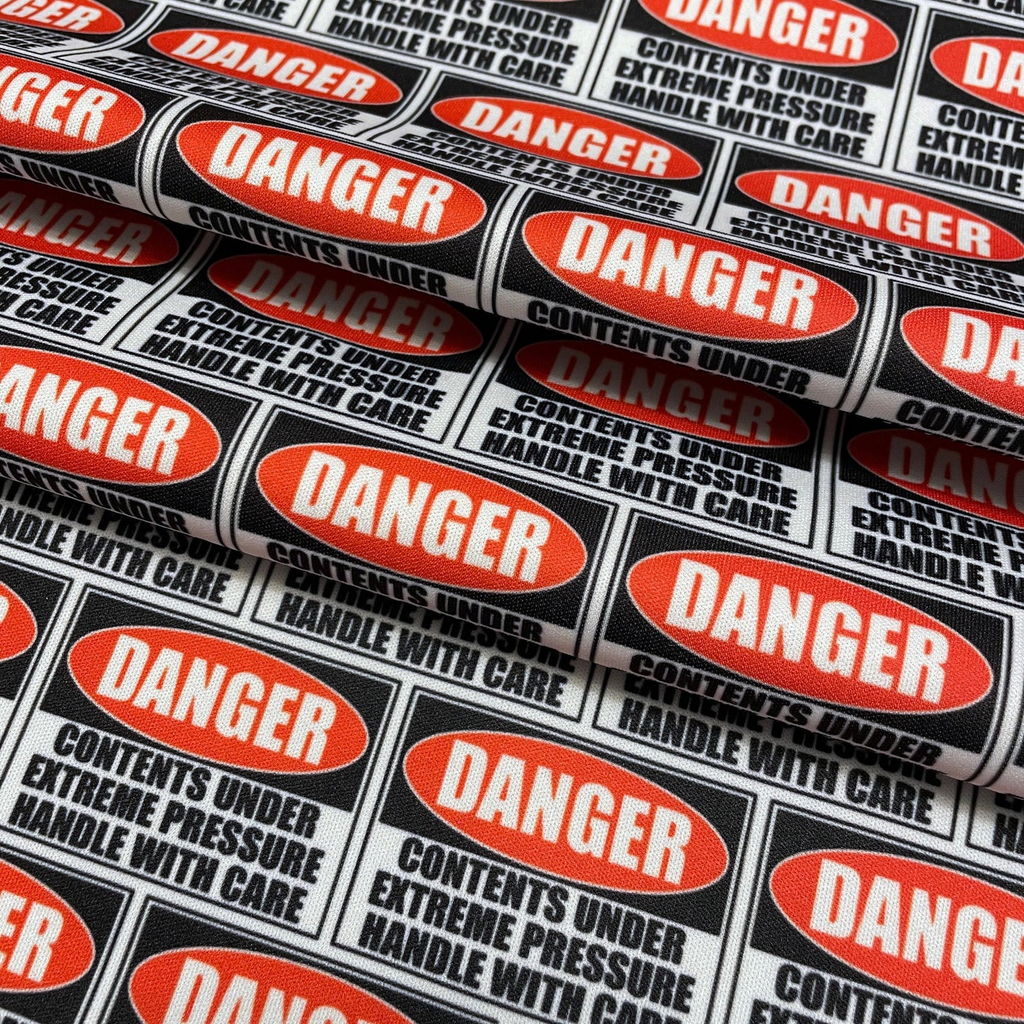Danger Sign PUL Waterproof Fabric - 1 mil - 60" wide - Contents under pressure handle with care