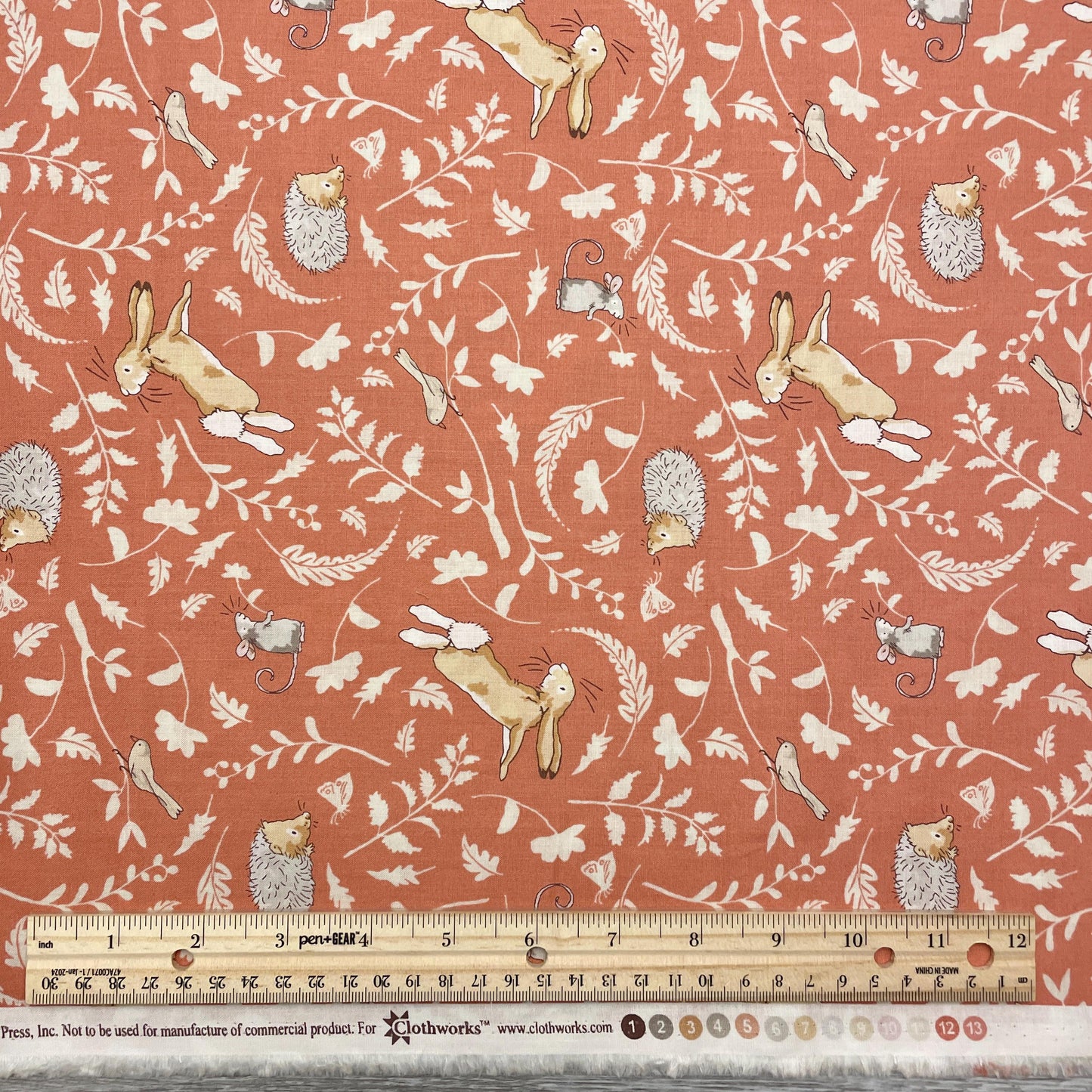 Baby fabric - Guess How Much I love you 2024 in Rust by Anita Jeram for Clothworks - 100% cotton fabric