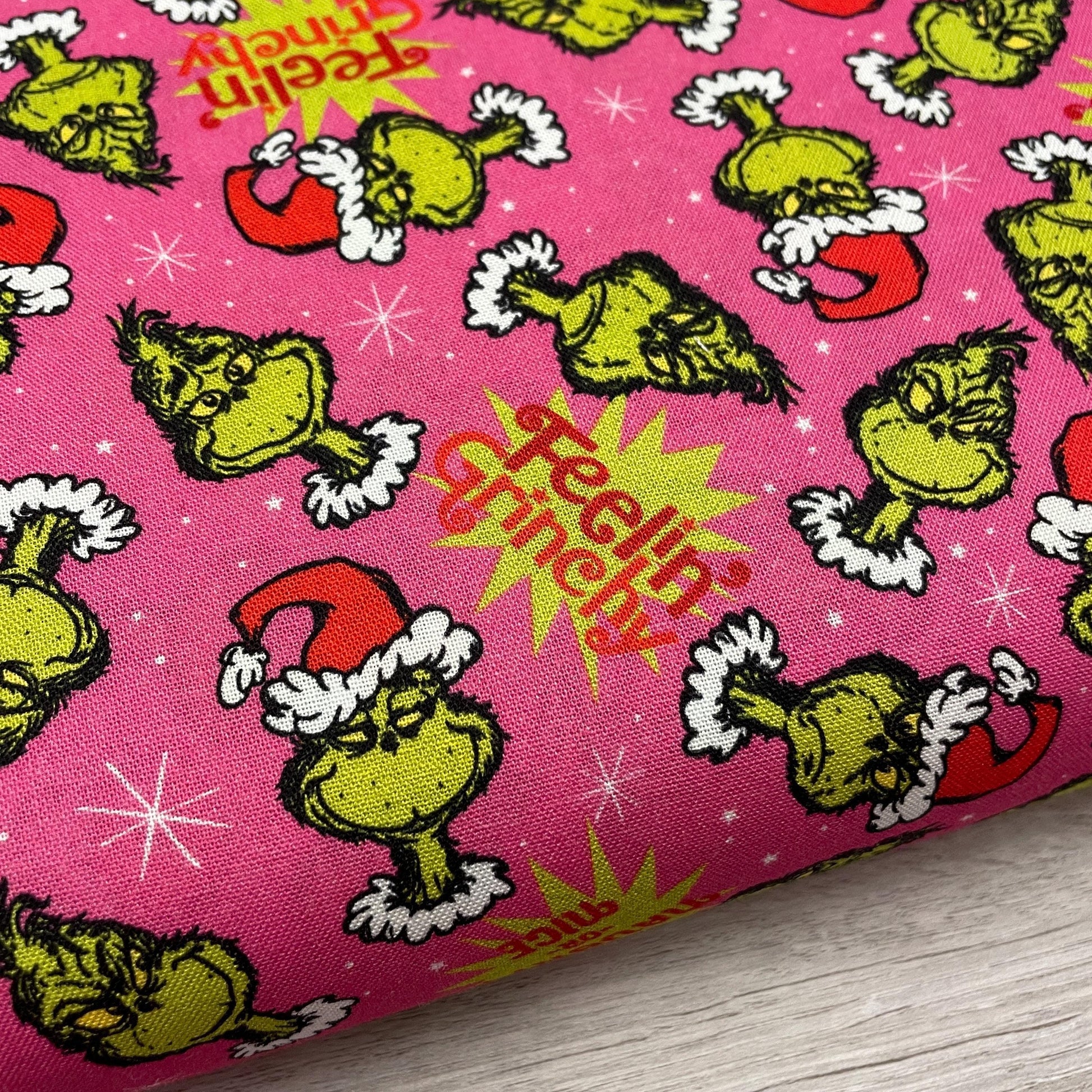 Robert Kaufman Grinch Fabric - Feelin' Grinchy Candy Pink - 100% cotton