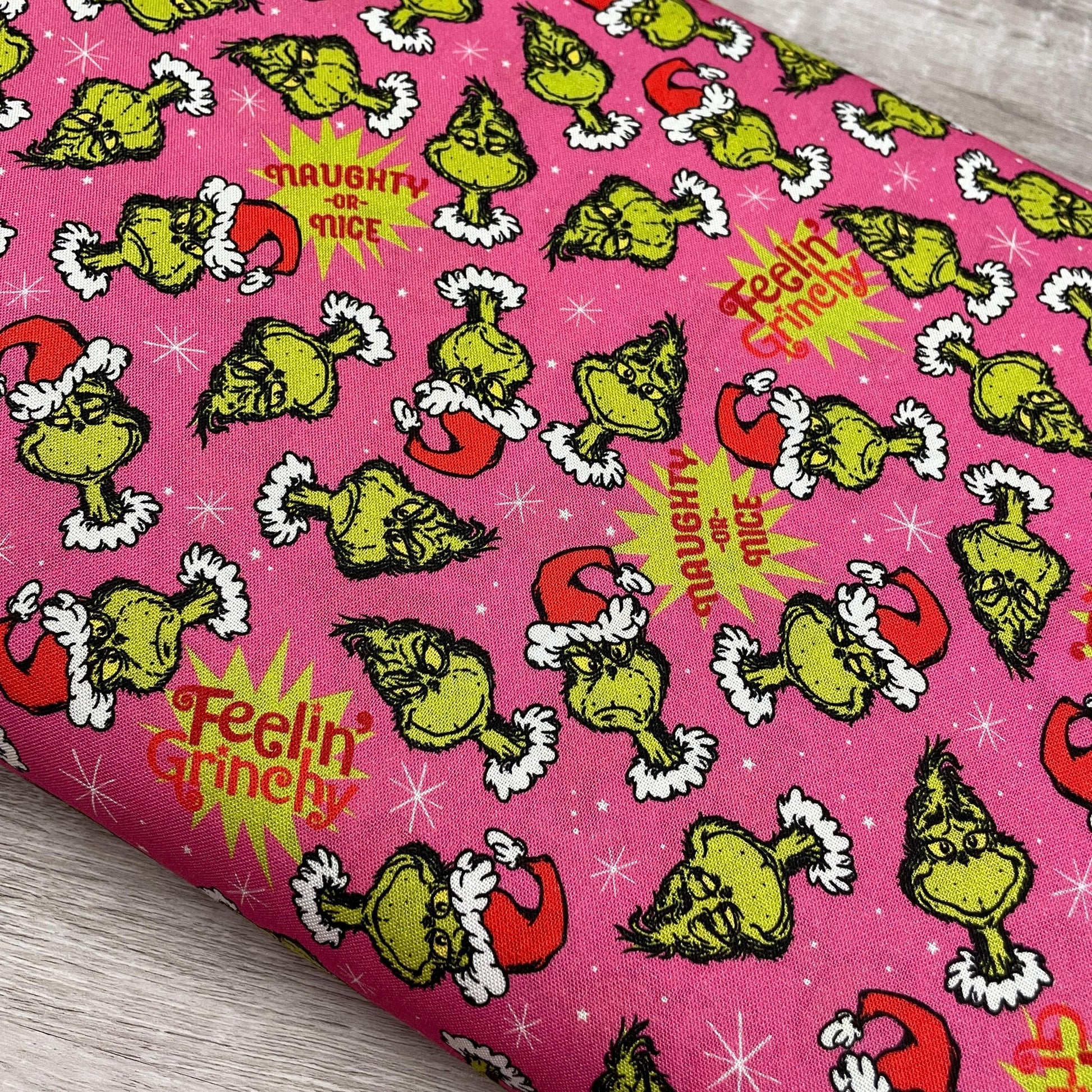 Robert Kaufman Grinch Fabric - Feelin' Grinchy Candy Pink - 100% cotton