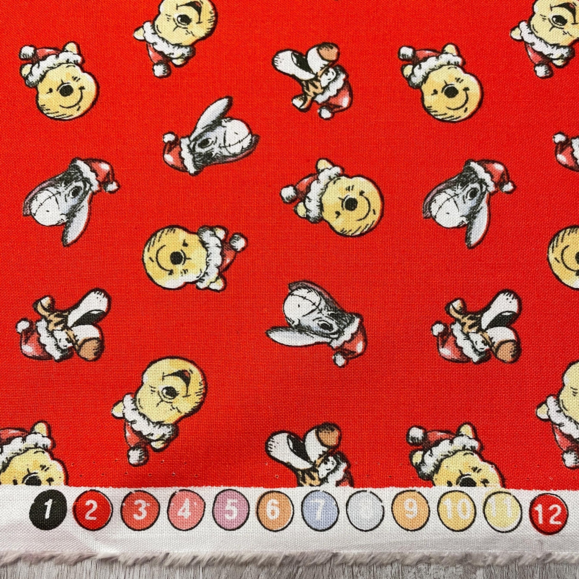 Winnie The Pooh Christmas fabric - Santa Hat Toss