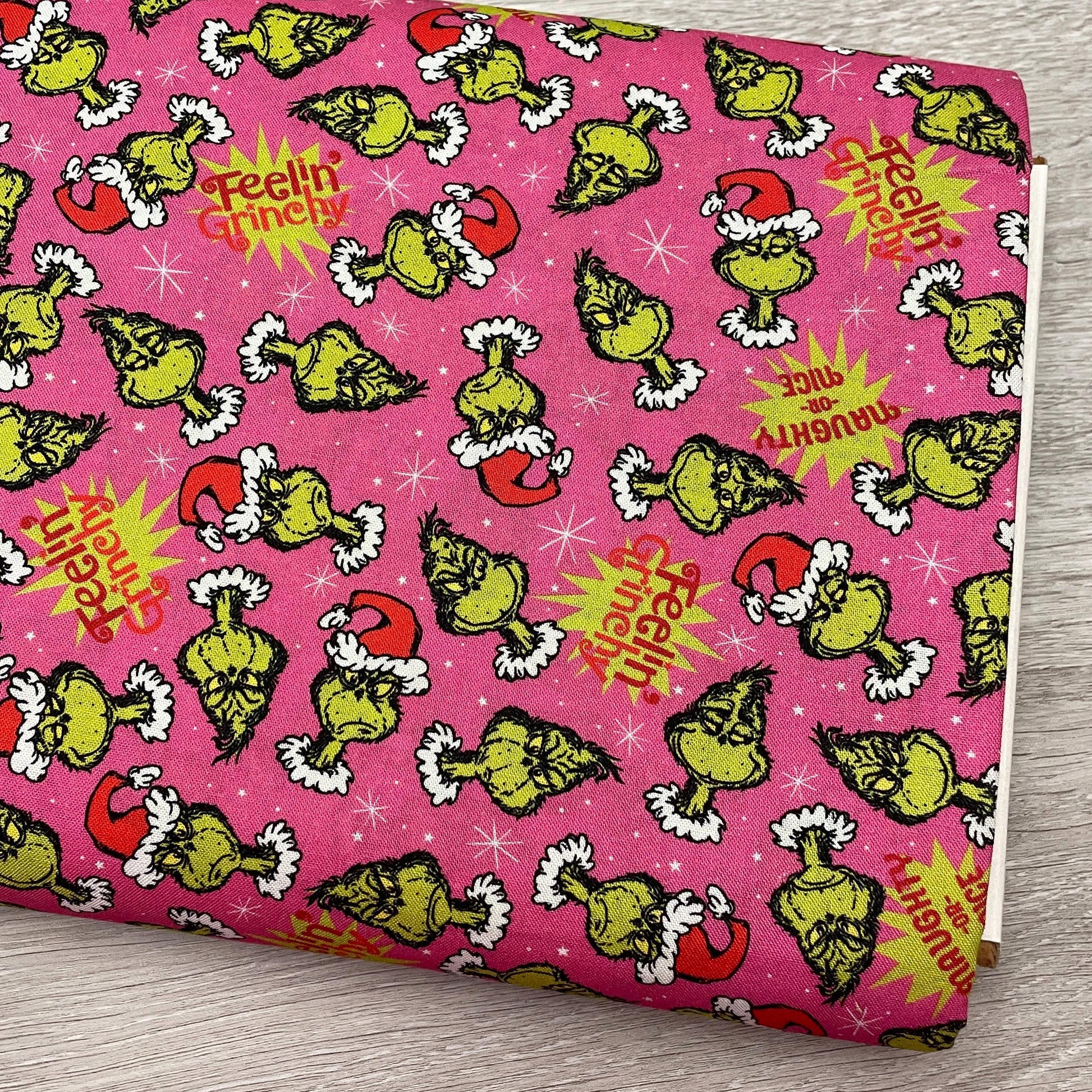 Robert Kaufman Grinch Fabric - Feelin' Grinchy Candy Pink - 100% cotton