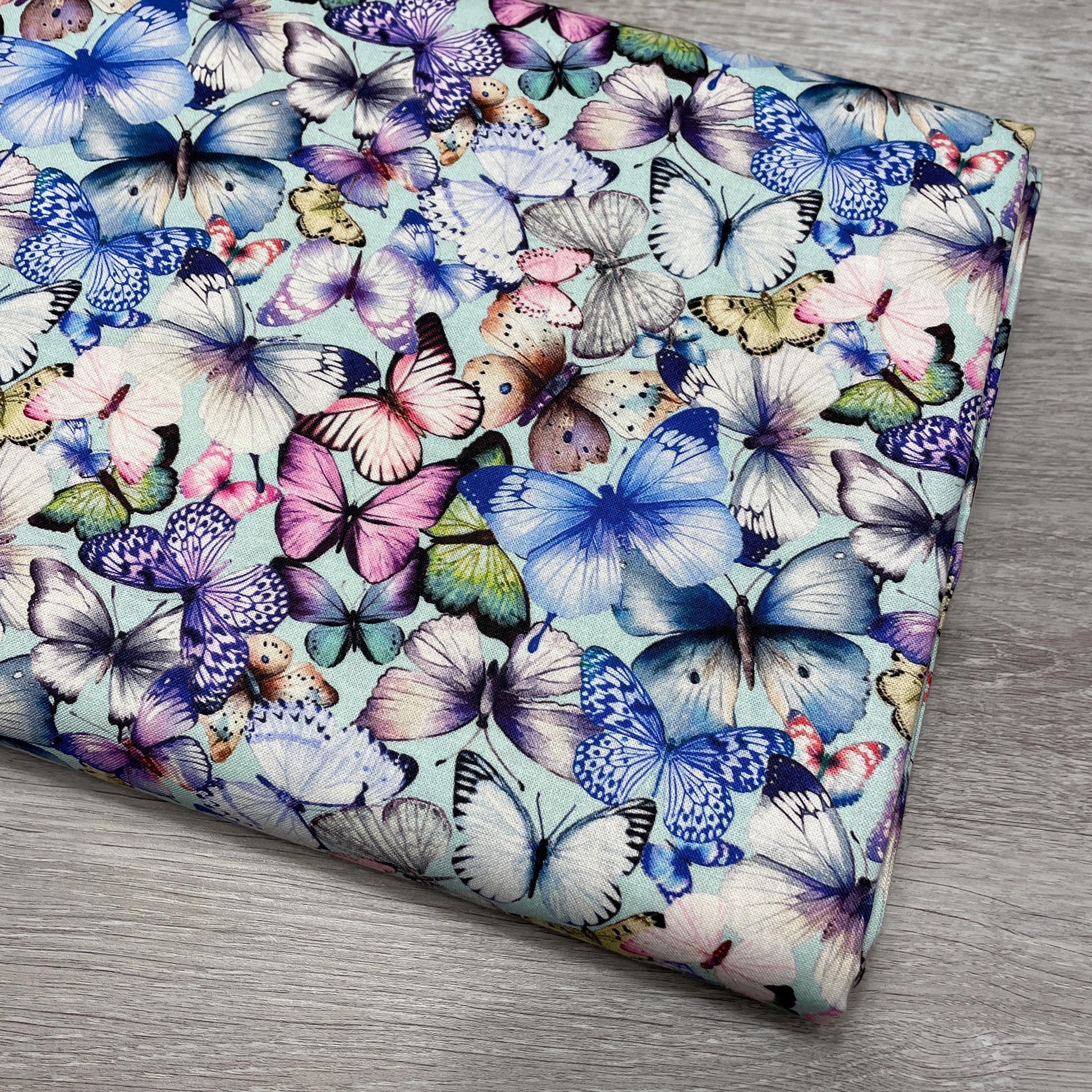 Tossed Pretty Butterfly fabric - Aqua - 100% Cotton - Butterfly Dreams Collection