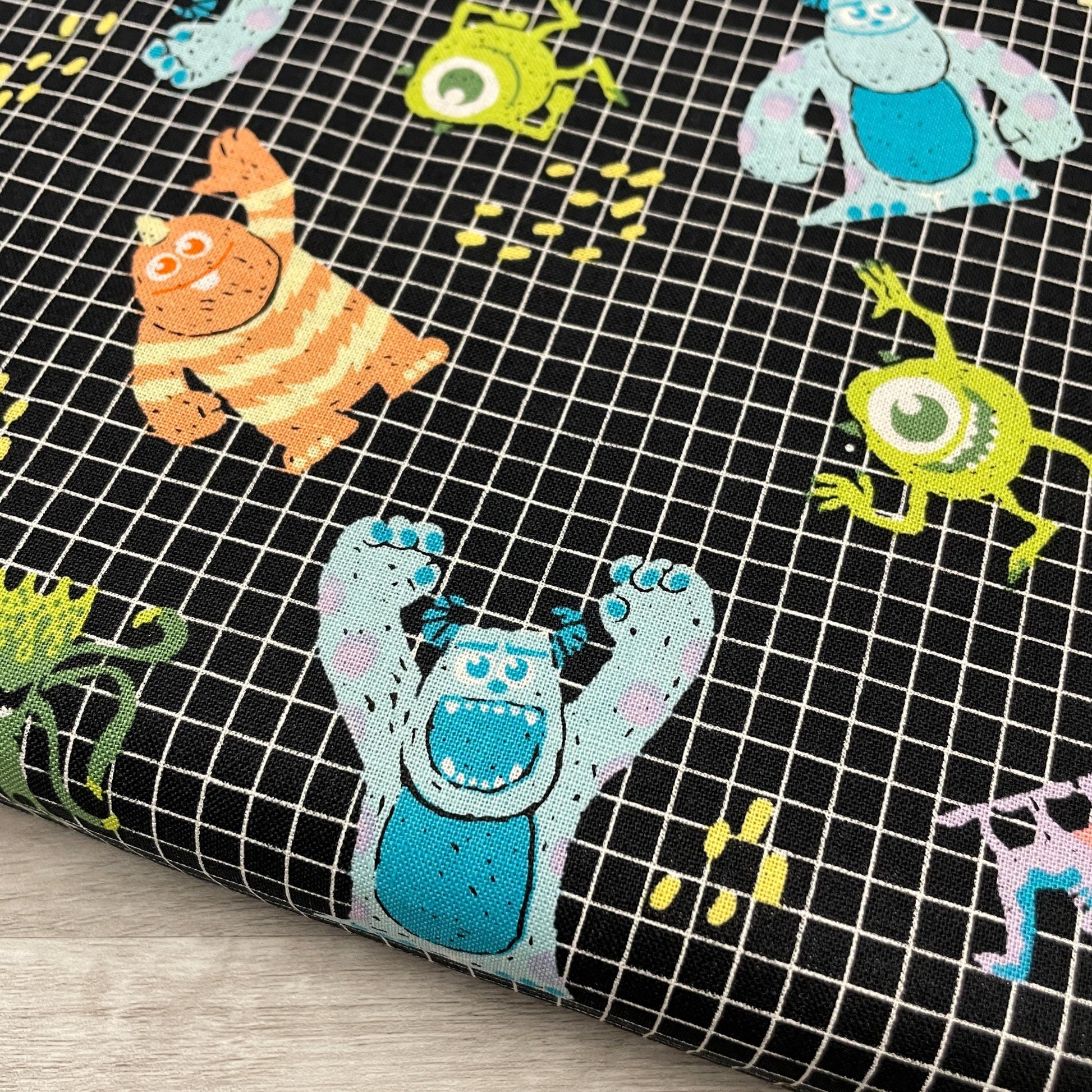 Monsters Inc Movie Fabric - Grid