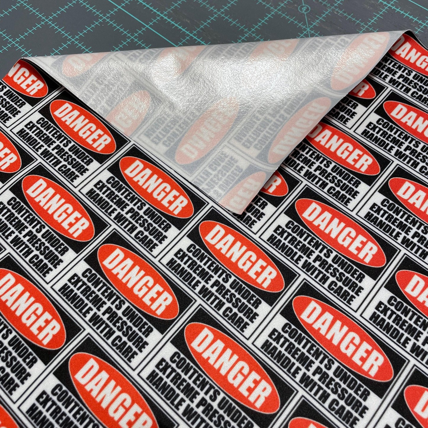 Danger Sign PUL Waterproof Fabric - 1 mil - 60" wide - Contents under pressure handle with care